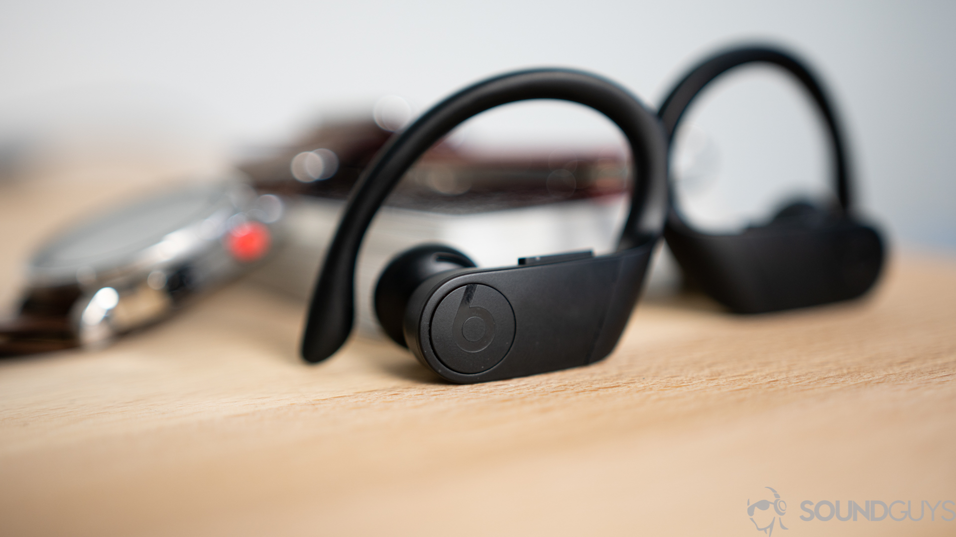 Beats Powerbeats Pro-5 A close-up photo of the playback control buttons on the Beats Powerbeats Pro.