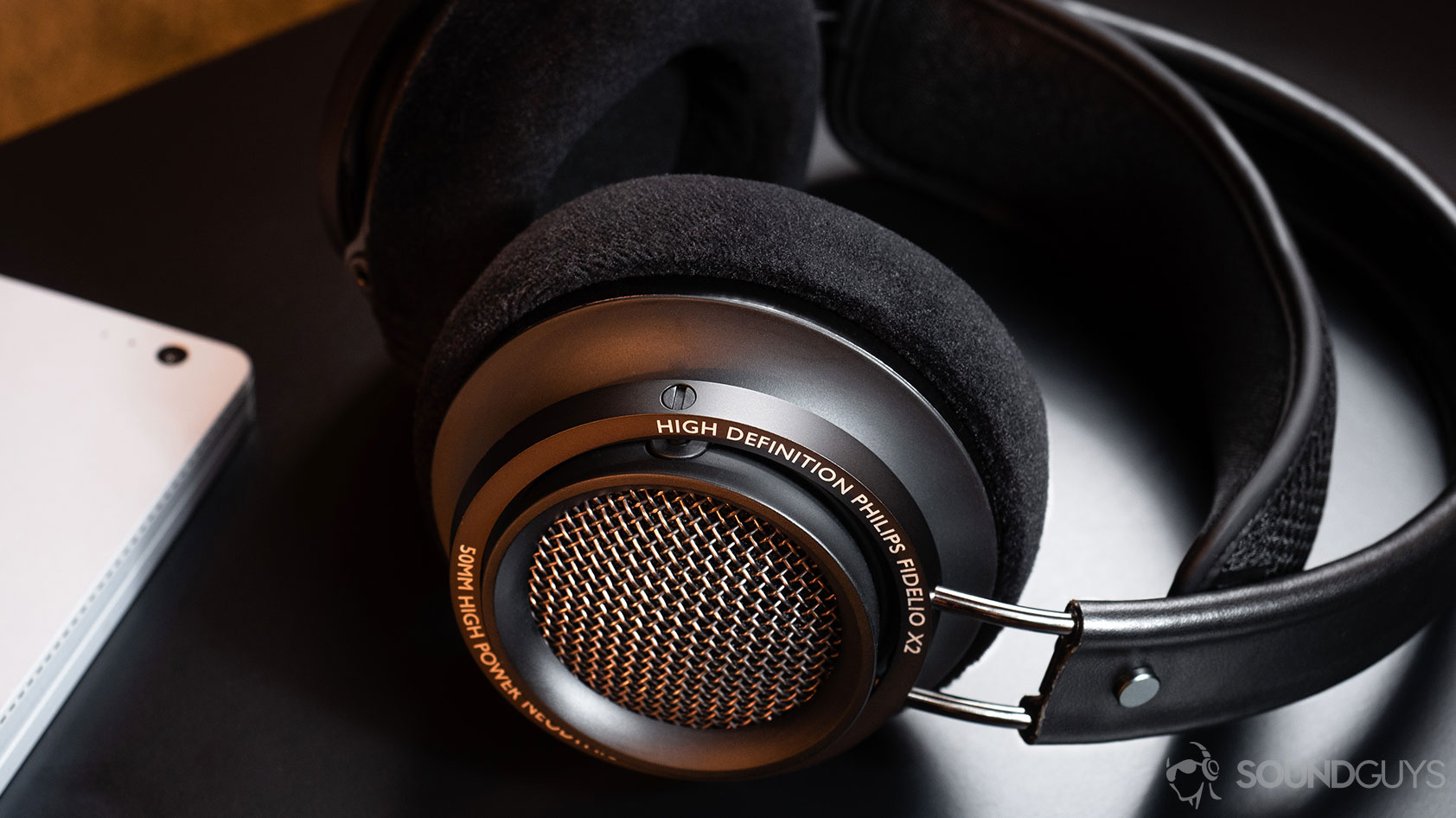 Philips Fidelio X2-over ear headphones high res A close-up image of the Philips Fidelio X2 open-back, over-ear headphones ear cups and grill.