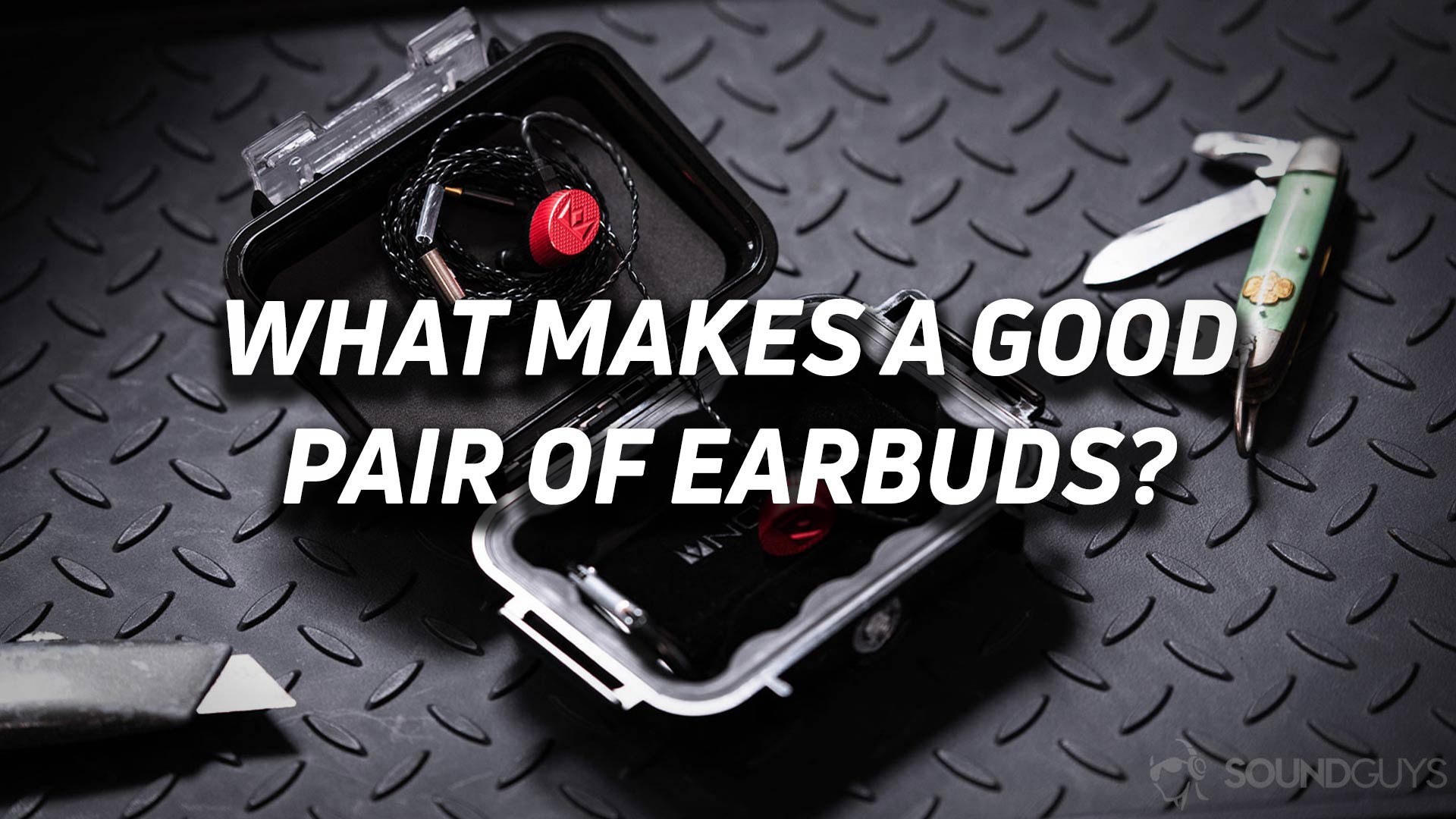 good pair of earbuds hero The Noble Kaiser 10 Massdrop IEMs in red inside a Pelican carrying case with the text "What makes a good pair of earbuds" overlaid.