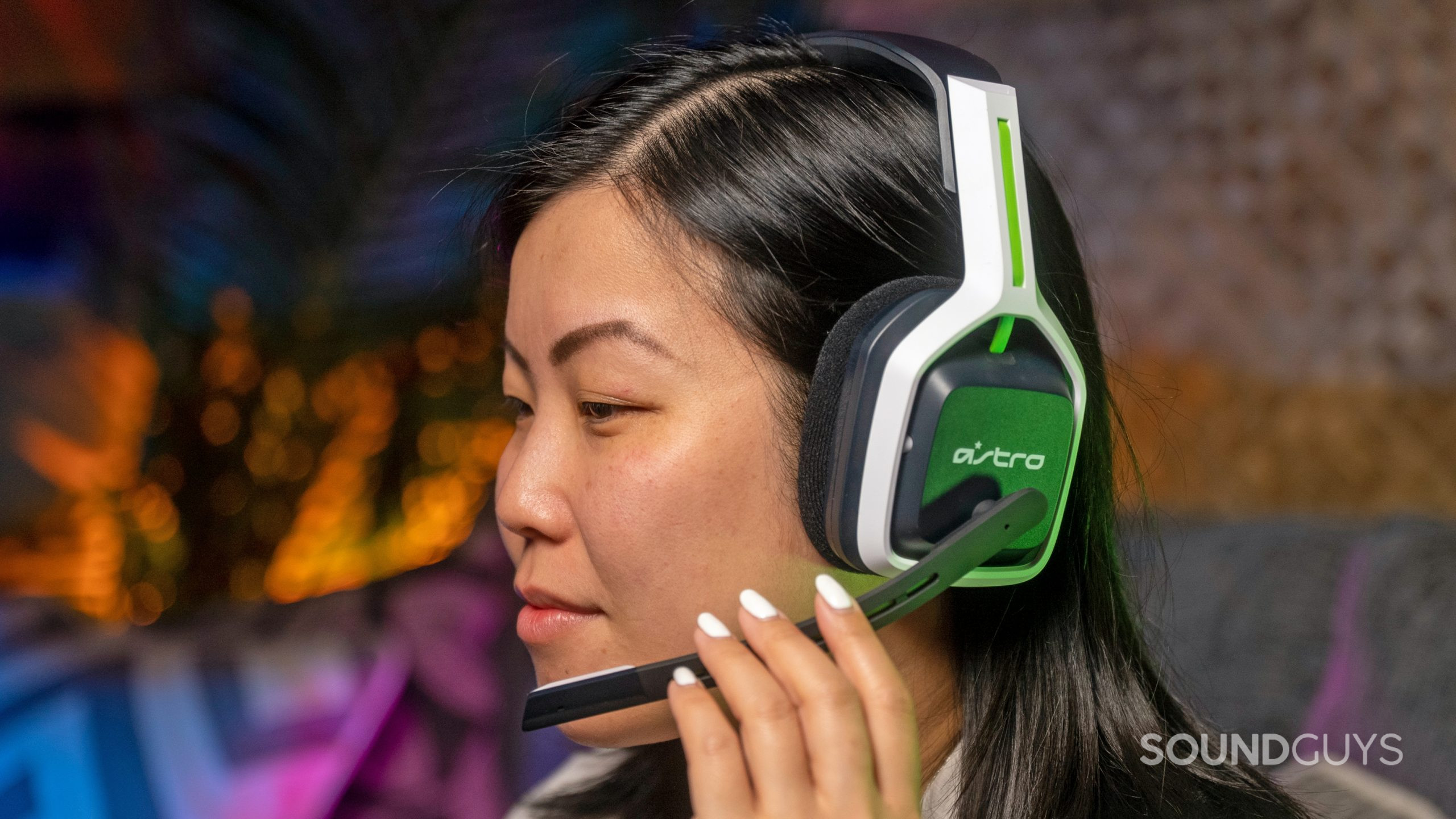 Astro-A20-headshot A woman wears the Astro A20 gaming headset at the SoundGuys offices.