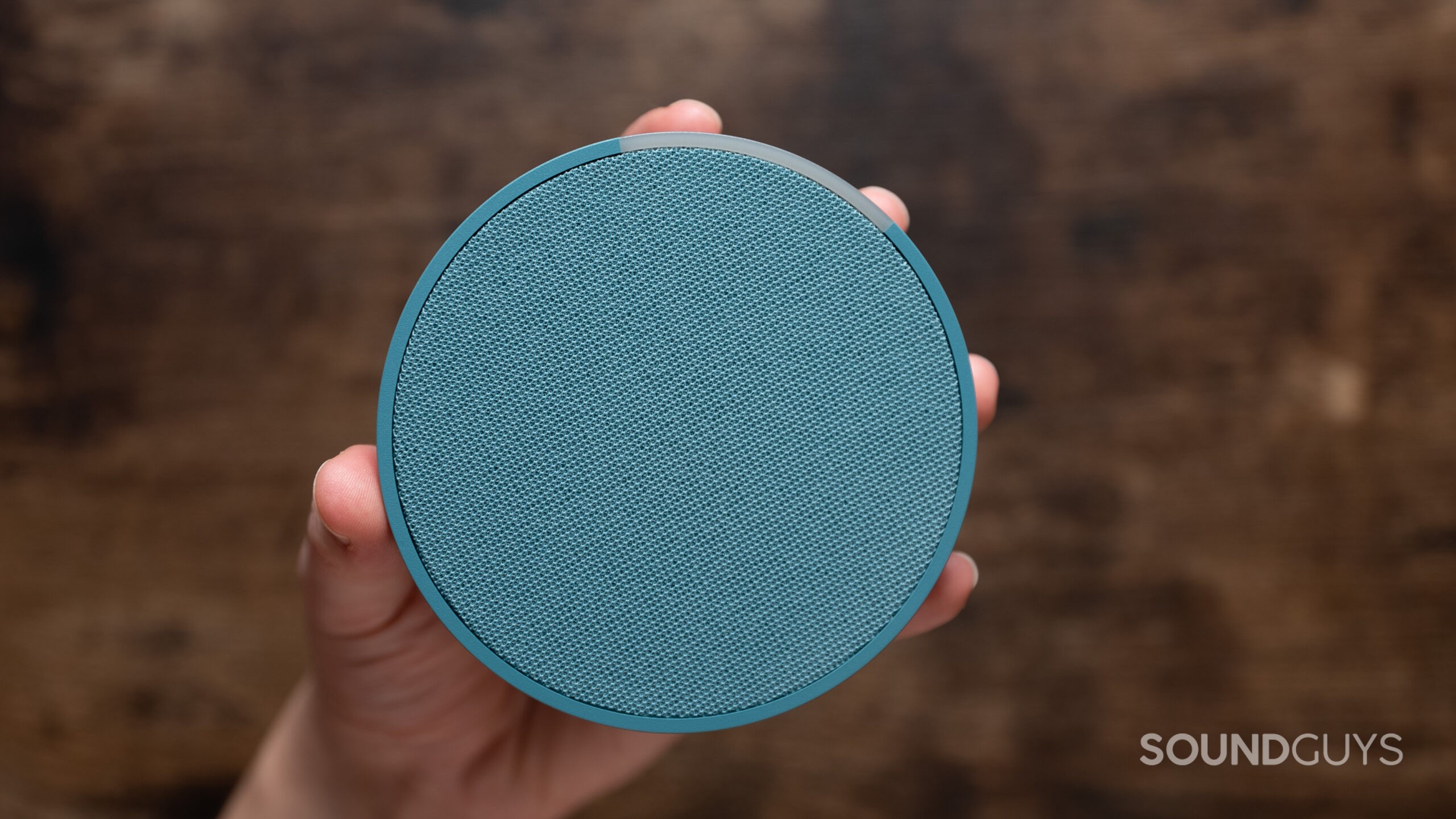 Echo-Pop-front-of-speaker Amazon Echo Pop speaker held in a hand.