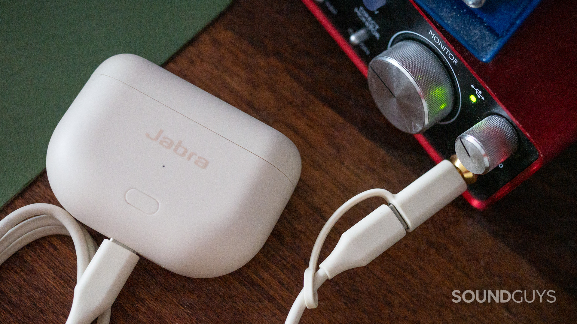 Jabra-Elite-10-Gen-2-plugin A photo of the Jabra Elite 10 Gen 2's case transmitting audio.